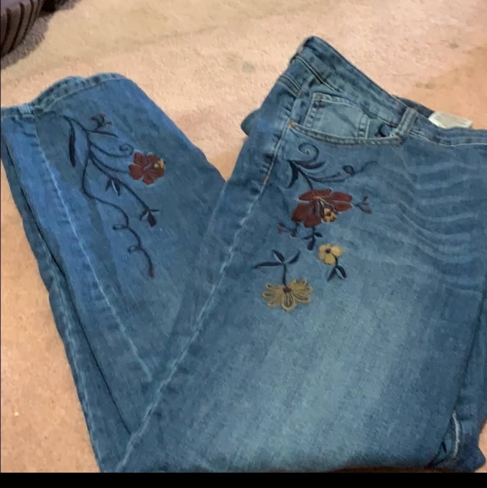 Embroidered straight legged jeans.